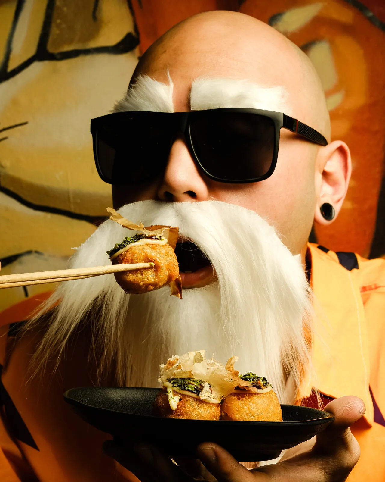 Costumed character eating sushi